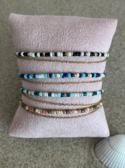 Bella I Bracelet double rang perles et chaine en acier inoxydable doré