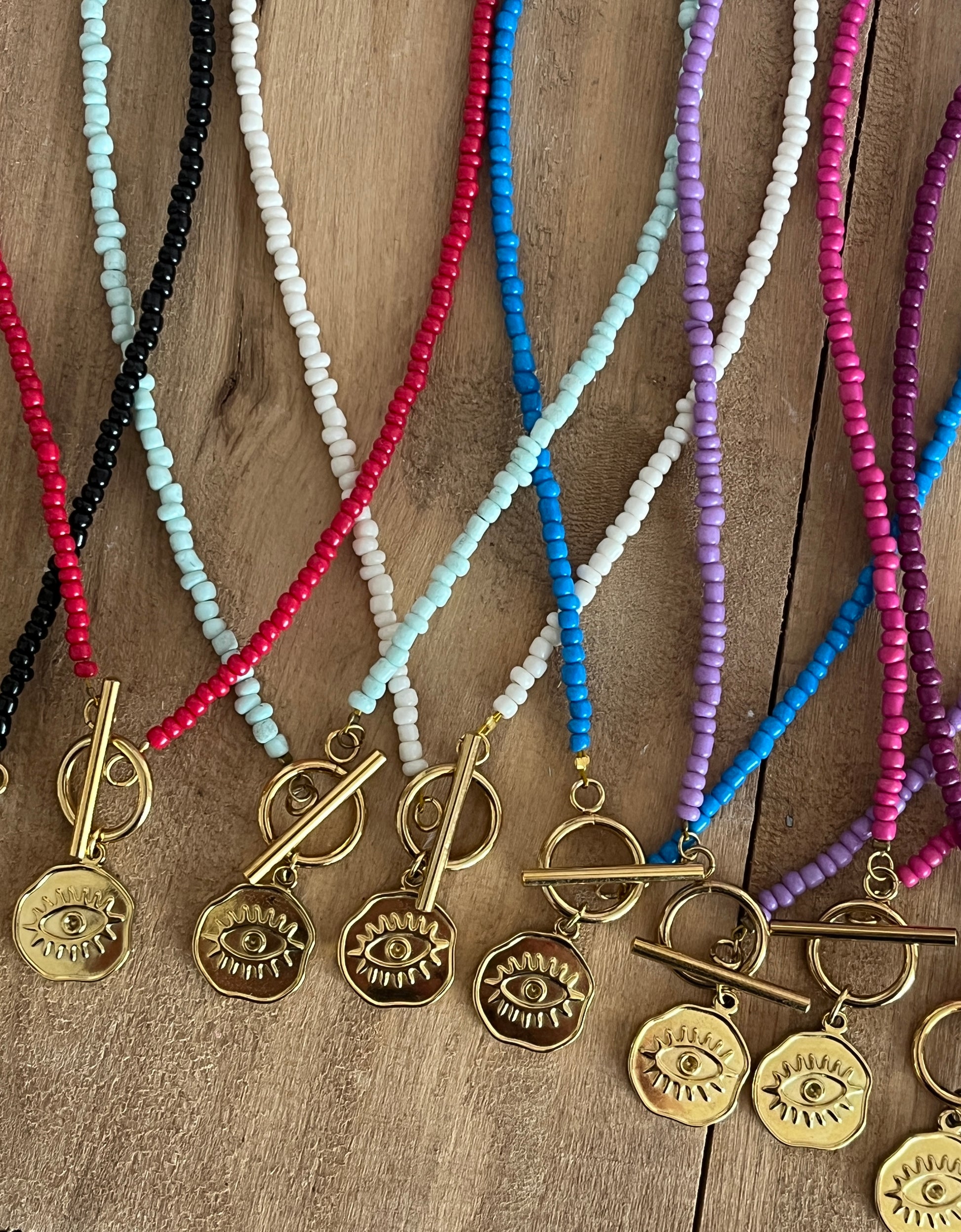 collier breloque mauvais oeil