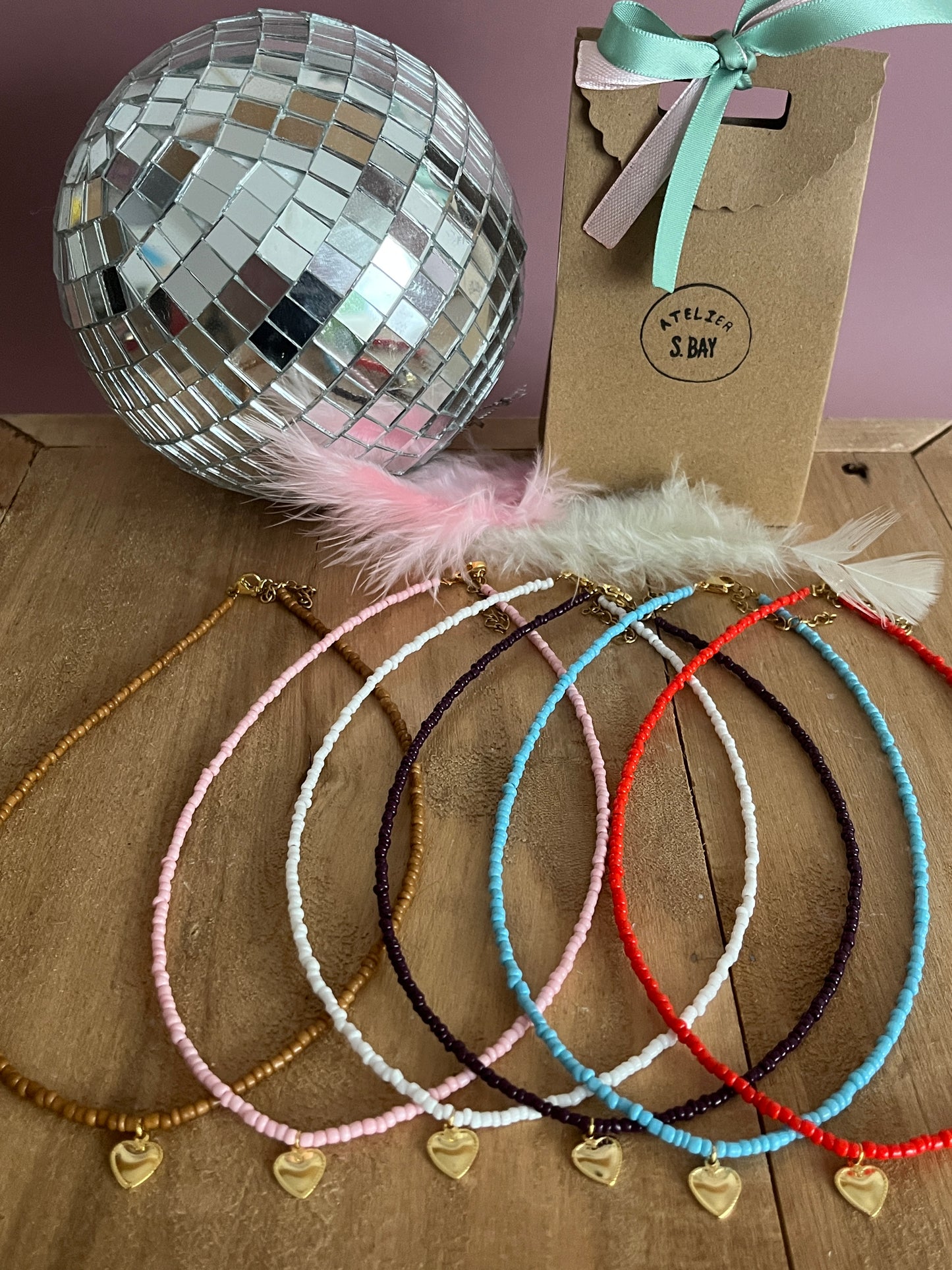 collier coeur perles