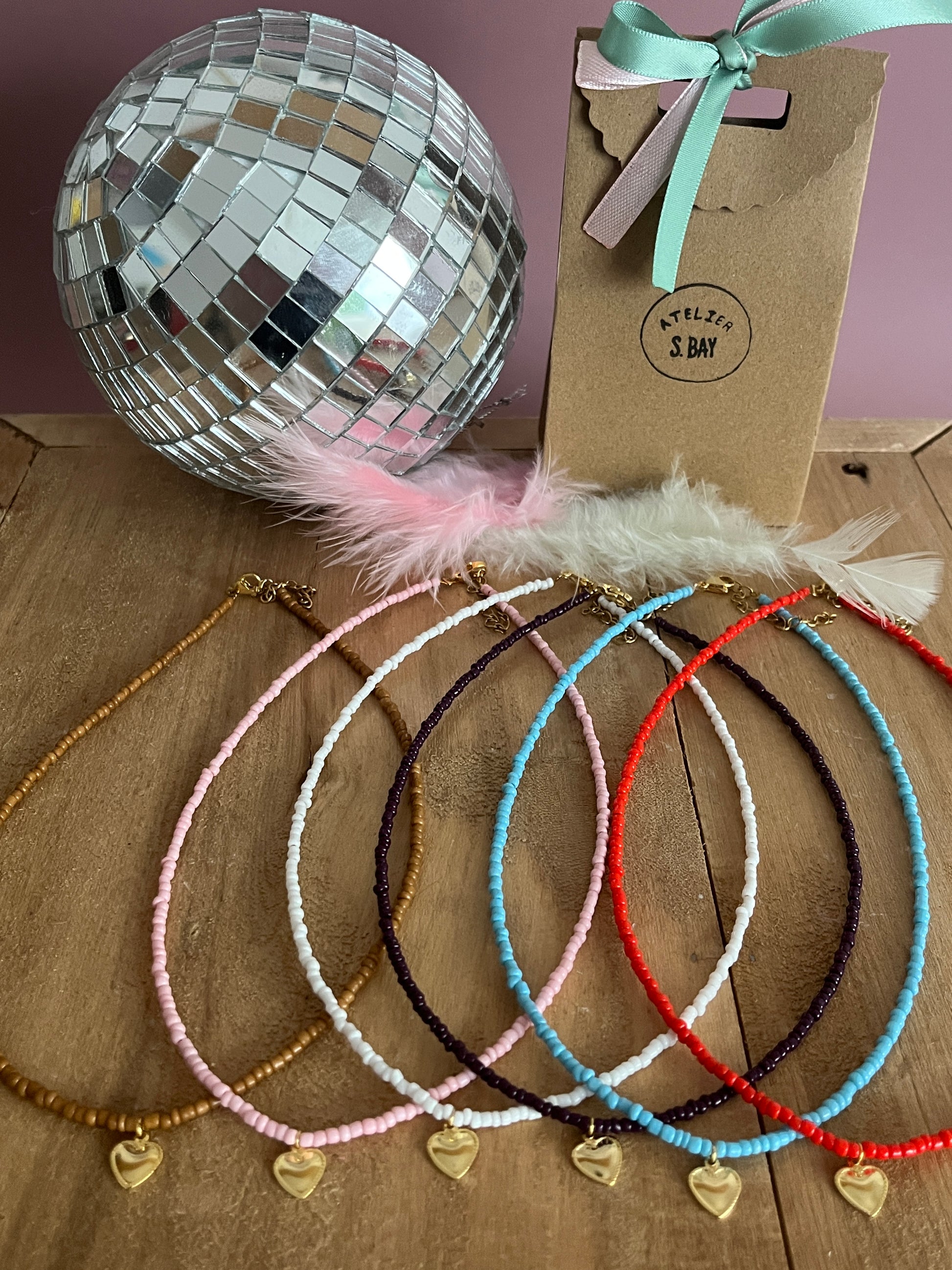 collier coeur perles