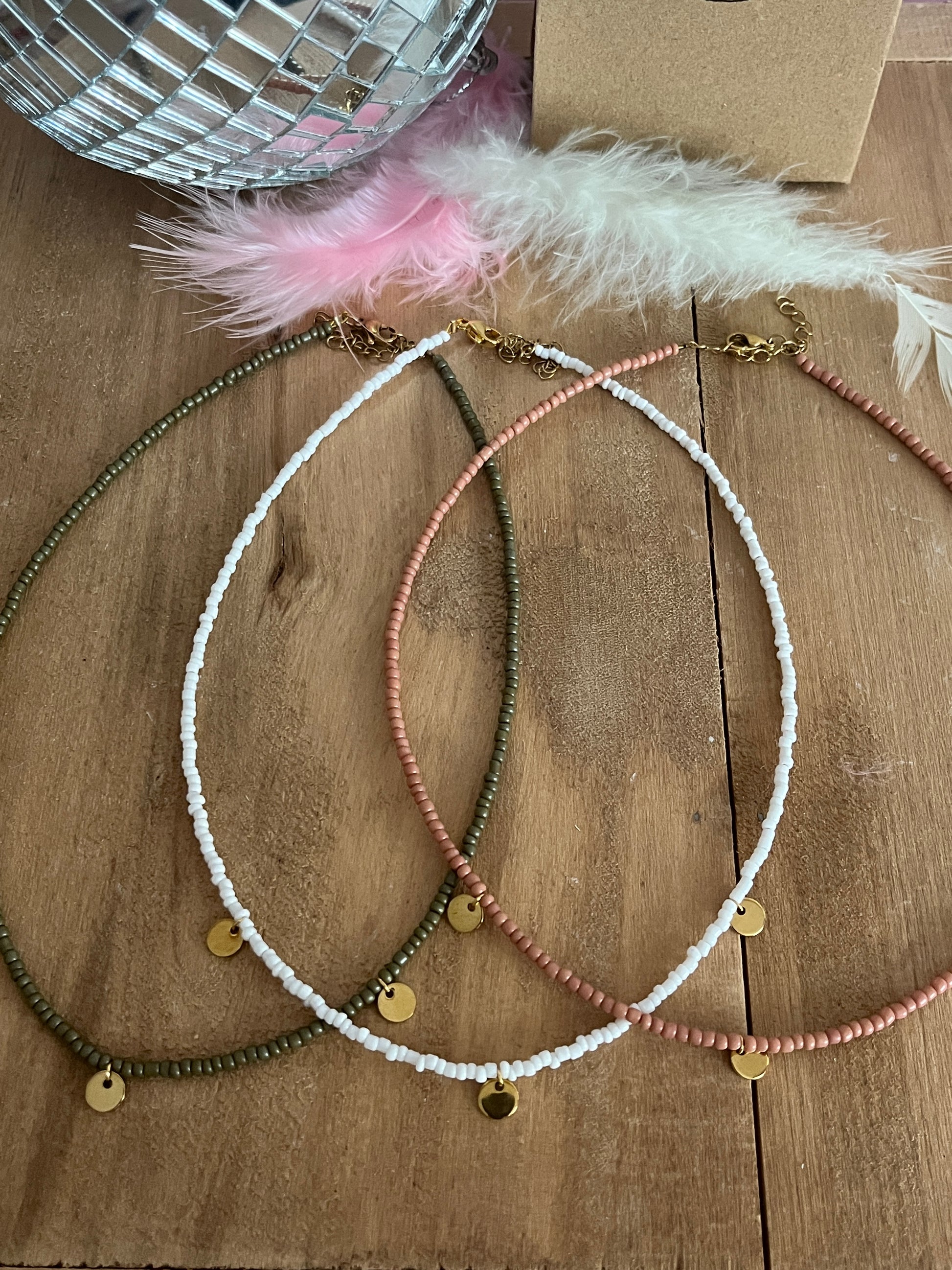 collier medaillon rond tendance