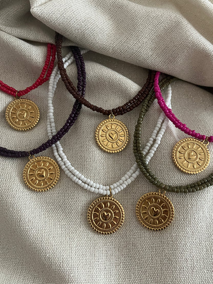 collier multirang perles medaillon