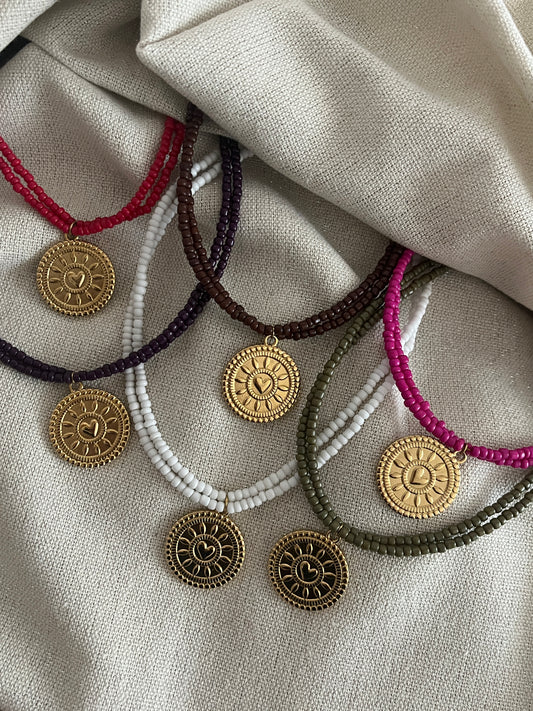 collier multirangs perles coeur