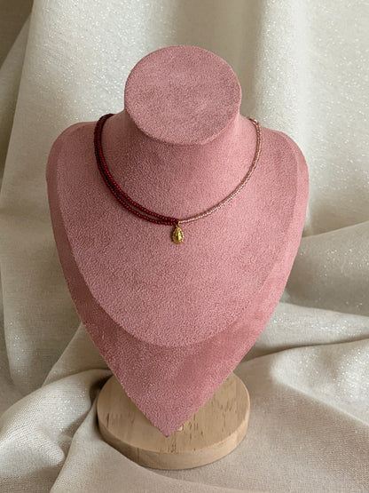 collier perles bordeaux coccinelle