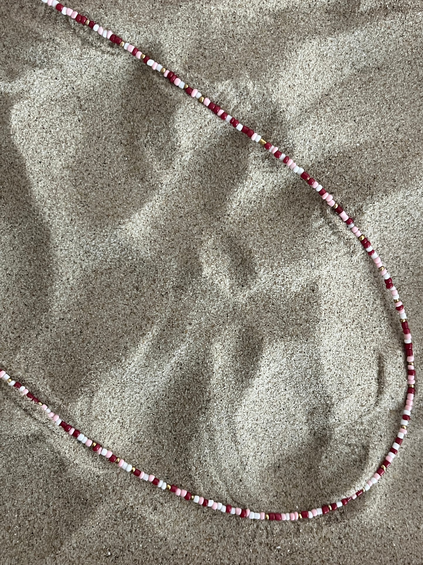 collier sautoir bordeaux