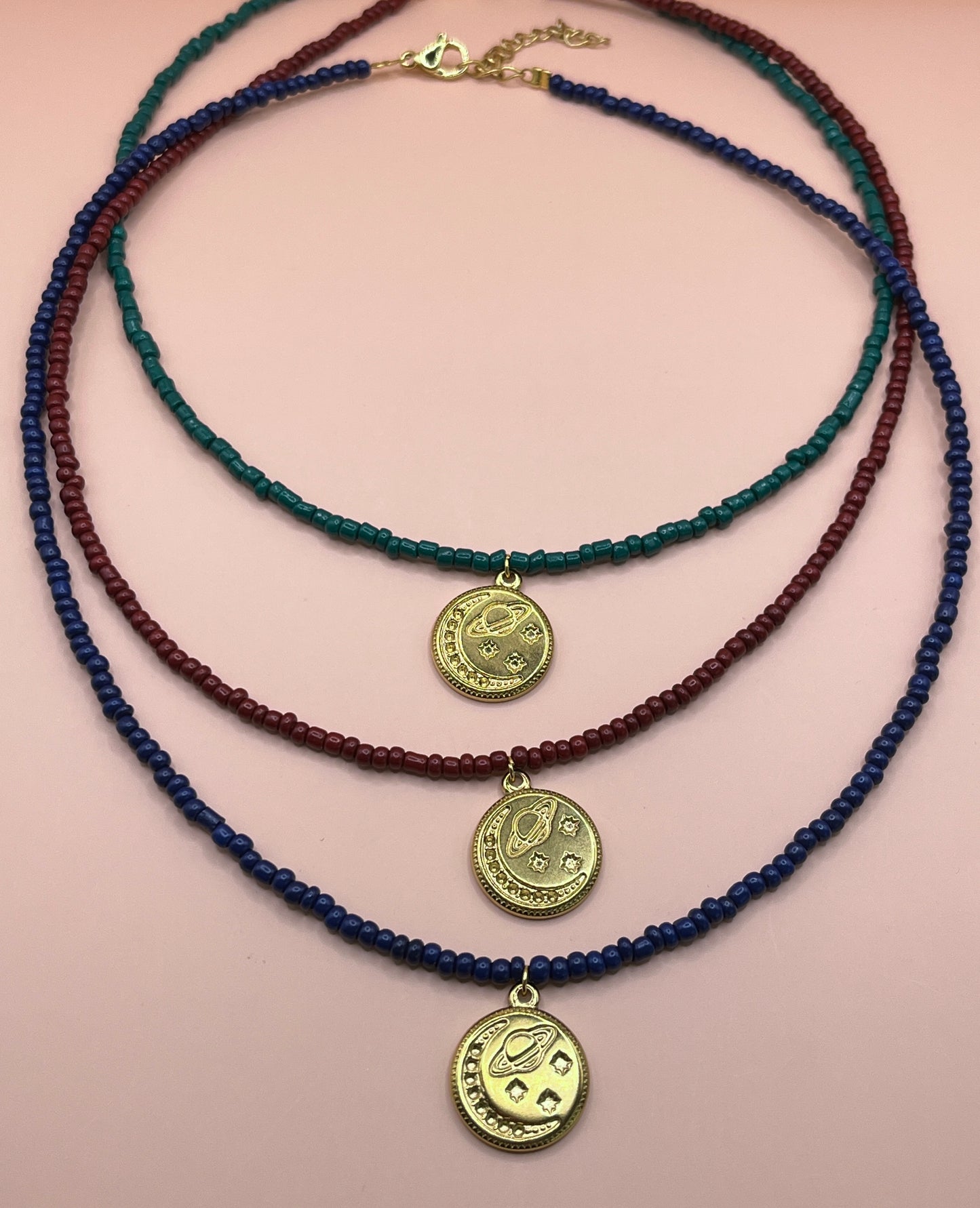 collier perles planète